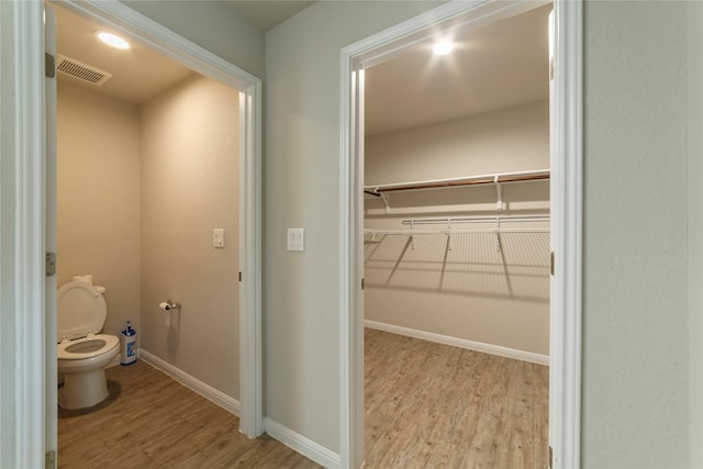 10126 Relic Oaks, San Antonio, TX 78240 - bathroom with wood finished floors and toilet