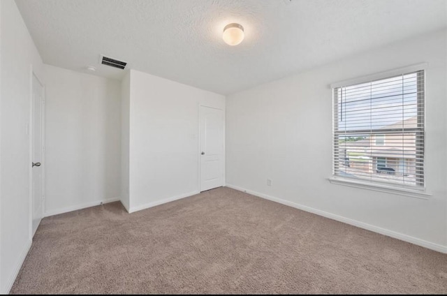 2019 Damasi Ln, Fresno, TX 77545 - unfurnished bedroom with carpet, a closet, and a textured ceiling