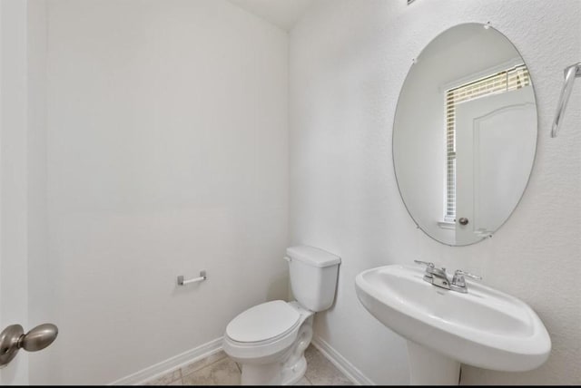 2019 Damasi Ln, Fresno, TX 77545 - bathroom featuring a sink and tile patterned floors