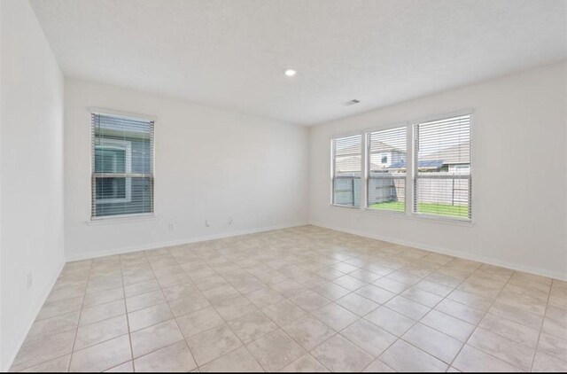 2019 Damasi Ln, Fresno, TX 77545 - spare room featuring recessed lighting and light tile patterned floors
