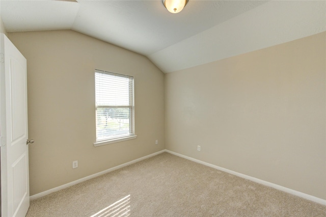 8115 Heartbrook Field Ln, Cypress, TX 77433 - spare room with lofted ceiling and carpet flooring