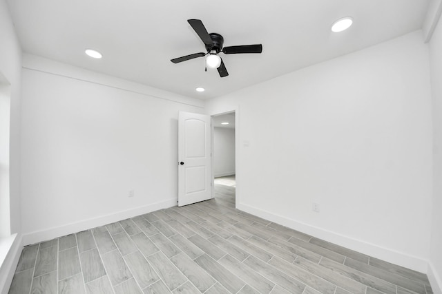 7208 Helmers St, Houston, TX 77022 - empty room featuring a ceiling fan, recessed lighting, and light wood-type flooring