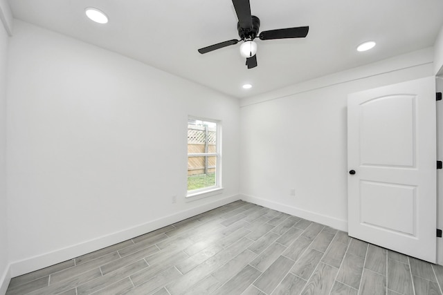 7208 Helmers St, Houston, TX 77022 - spare room with light wood finished floors, a ceiling fan, and recessed lighting