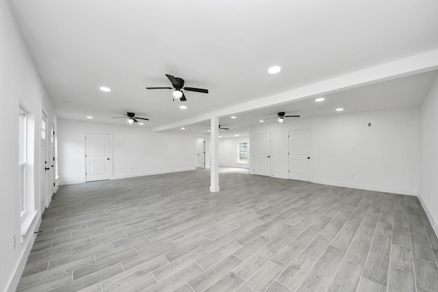 7208 Helmers St, Houston, TX 77022 - unfurnished living room with recessed lighting, light wood-style flooring, and ceiling fan