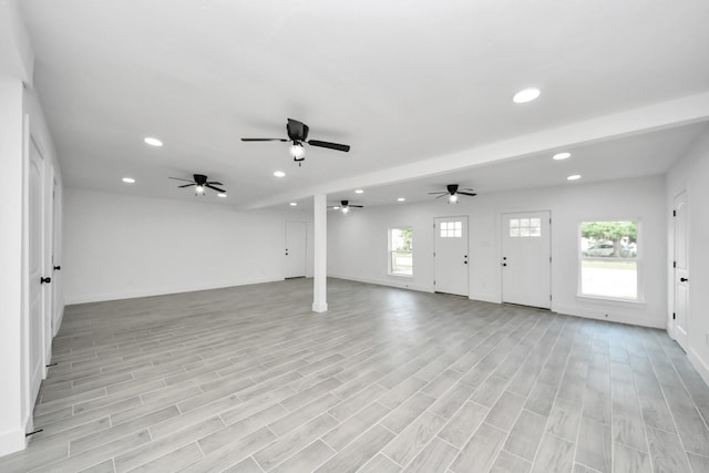 7208 Helmers St, Houston, TX 77022 - unfurnished living room featuring recessed lighting, ceiling fan, and light wood-style floors