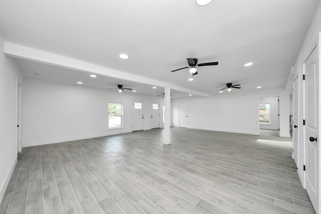 7208 Helmers St, Houston, TX 77022 - unfurnished living room featuring recessed lighting, ceiling fan, and light wood-style flooring