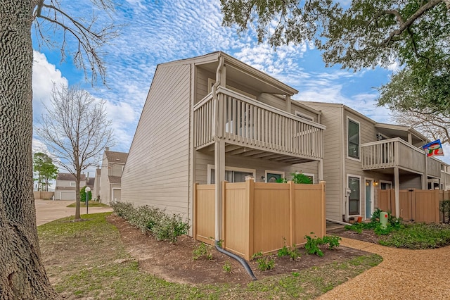2379 Briarwest Blvd Unit 46, Houston, TX 77077 - rear view of property featuring a balcony