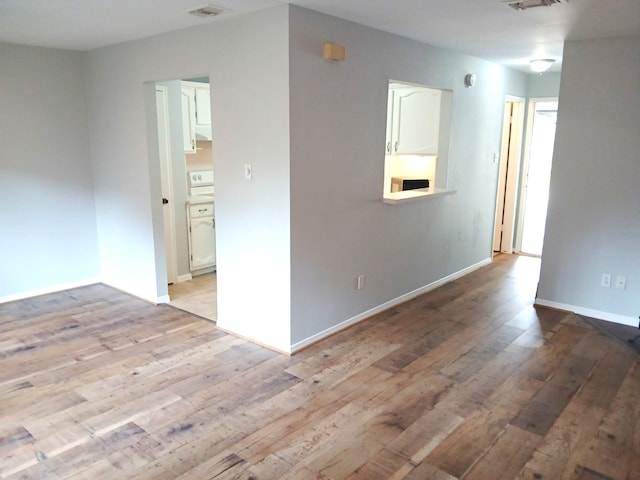 2379 Briarwest Blvd Unit 46, Houston, TX 77077 - unfurnished room with light wood-type flooring and baseboards