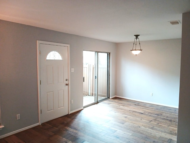 2379 Briarwest Blvd Unit 46, Houston, TX 77077 - foyer entrance with wood-type flooring and baseboards