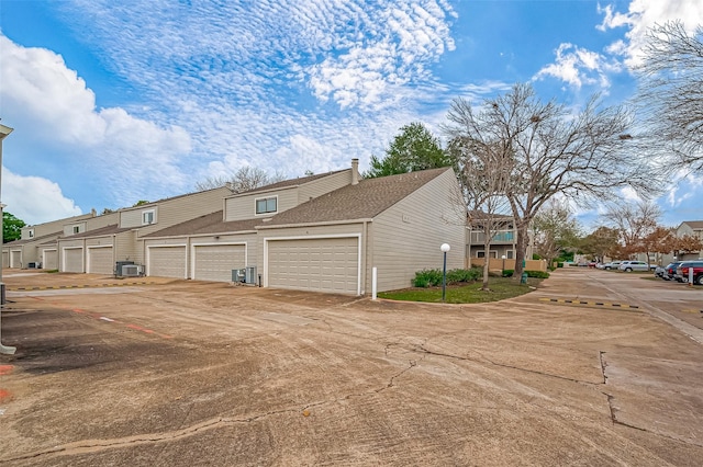 2379 Briarwest Blvd Unit 46, Houston, TX 77077 - view of property exterior with a residential view and a central air condition unit