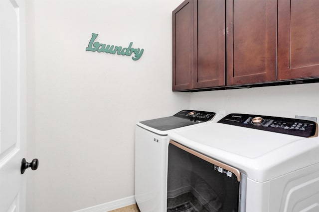 26642 Becker Pines Ln, Katy, TX 77494 - laundry room featuring washing machine and dryer and cabinet space