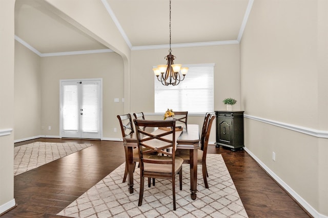 26642 Becker Pines Ln, Katy, TX 77494 - dining space with plenty of natural light, a chandelier, wood finished floors, and ornamental molding