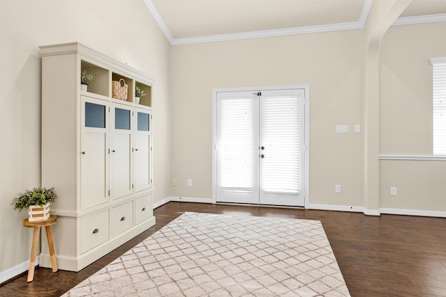 26642 Becker Pines Ln, Katy, TX 77494 - mudroom featuring crown molding, dark wood finished floors, and arched walkways