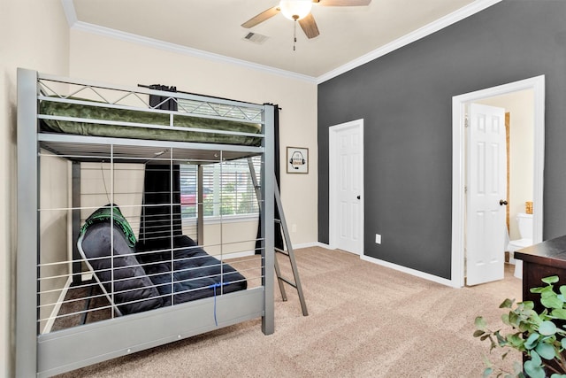 26642 Becker Pines Ln, Katy, TX 77494 - carpeted bedroom with ornamental molding, ceiling fan, and ensuite bath