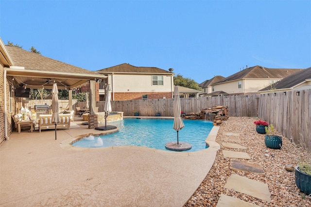 26642 Becker Pines Ln, Katy, TX 77494 - view of pool featuring a patio, a fenced backyard, a ceiling fan, and a pool with connected hot tub