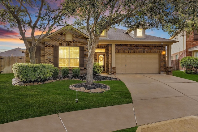 26642 Becker Pines Ln, Katy, TX 77494 - view of front of house featuring brick siding, driveway, a garage, and roof with shingles