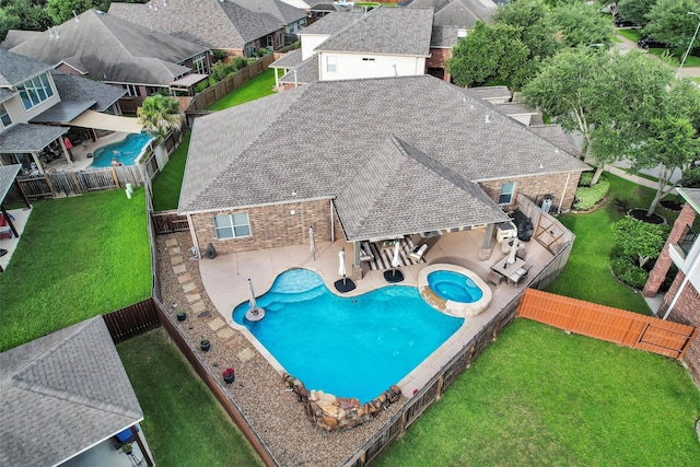 26642 Becker Pines Ln, Katy, TX 77494 - view of swimming pool with a fenced backyard, an in-ground hot tub, a patio area, and a residential view