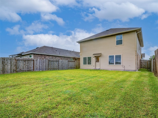 114 Austin Rd, Angleton, TX 77515 - rear view of house featuring a fenced backyard