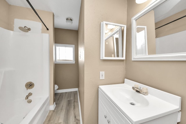 11877 Algonquin Dr, Houston, TX 77089 - full bath with vanity, wood finished floors, and  shower combination