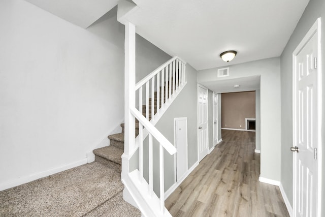 11877 Algonquin Dr, Houston, TX 77089 - stairway featuring baseboards and wood finished floors