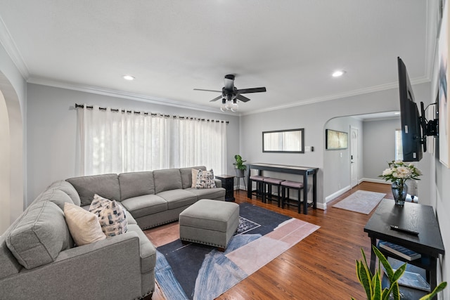 1926 Blodgett St, Houston, TX 77004 - living area with arched walkways, a ceiling fan, wood finished floors, recessed lighting, and ornamental molding