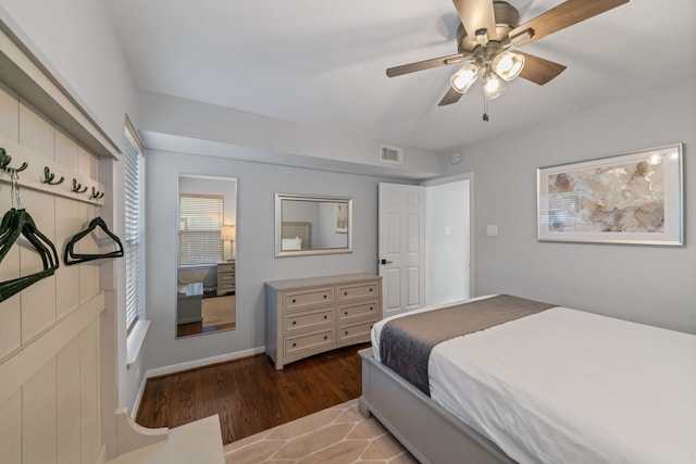 1926 Blodgett St, Houston, TX 77004 - bedroom with wood finished floors and ceiling fan