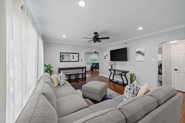 1926 Blodgett St, Houston, TX 77004 - living area with arched walkways, wood finished floors, recessed lighting, ceiling fan, and crown molding
