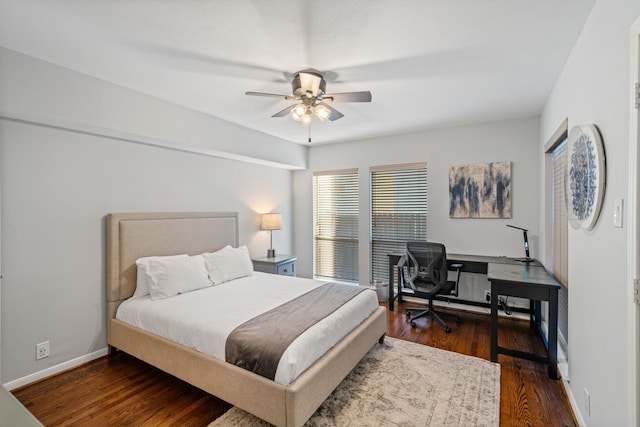 1926 Blodgett St, Houston, TX 77004 - bedroom with wood finished floors, ceiling fan, and a desk