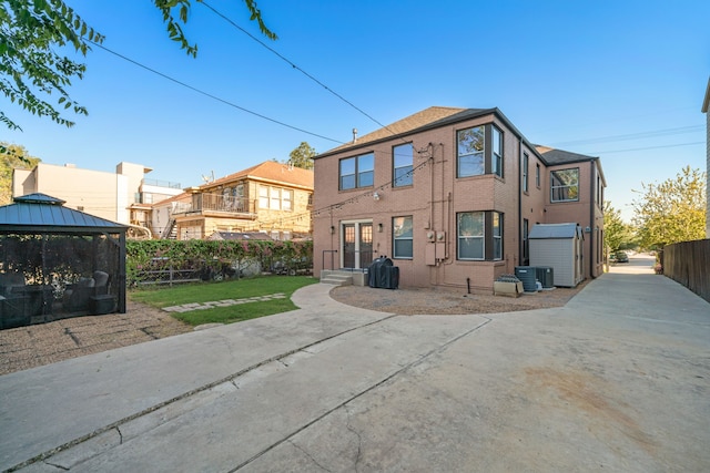 1926 Blodgett St, Houston, TX 77004 - view of front facade with a gazebo and brick siding