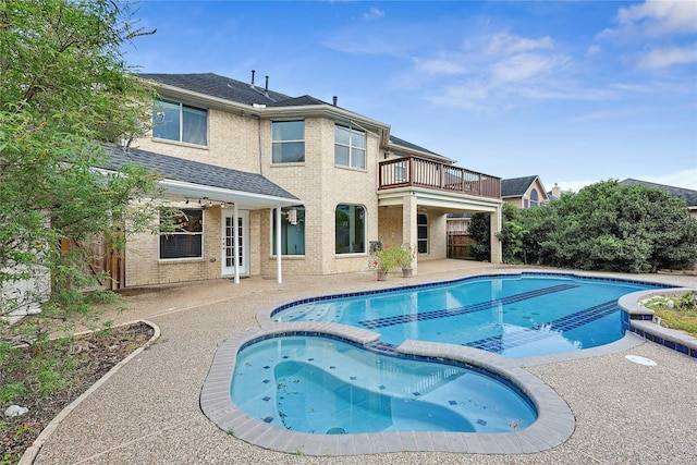 1423 Meadow Lakes Dr, Sugar Land, TX 77479 - view of pool with a patio area and a pool with connected hot tub