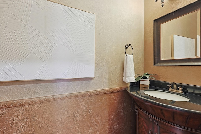 1423 Meadow Lakes Dr, Sugar Land, TX 77479 - bathroom featuring vanity and a wainscoted wall