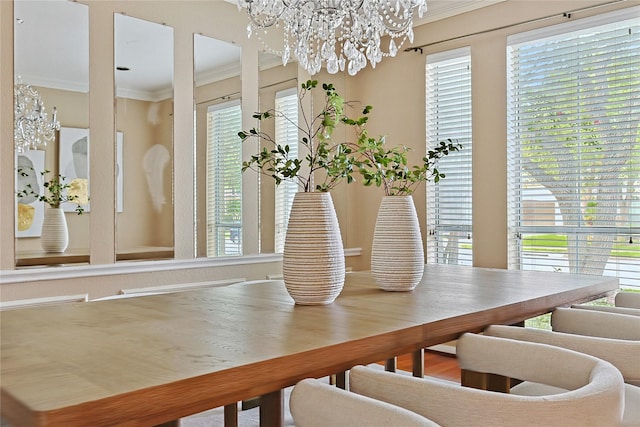 1423 Meadow Lakes Dr, Sugar Land, TX 77479 - dining space featuring a chandelier and ornamental molding