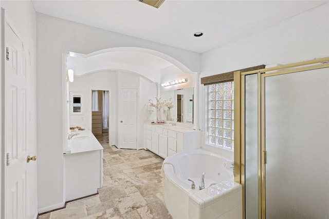 1423 Meadow Lakes Dr, Sugar Land, TX 77479 - bathroom featuring vanity, a shower stall, and a jetted tub