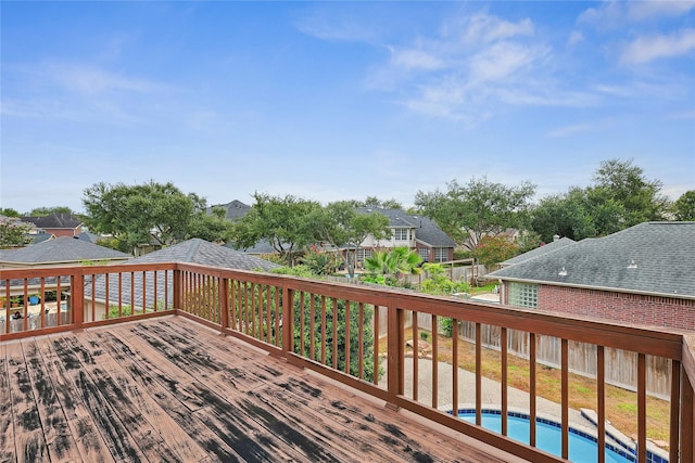 1423 Meadow Lakes Dr, Sugar Land, TX 77479 - deck featuring an outdoor pool and a residential view
