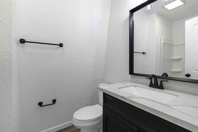 810 W Cattle Dr, Onalaska, TX 77360 - bathroom with vanity and wood finished floors