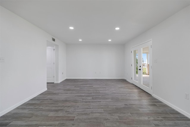 810 W Cattle Dr, Onalaska, TX 77360 - empty room with recessed lighting and wood finished floors