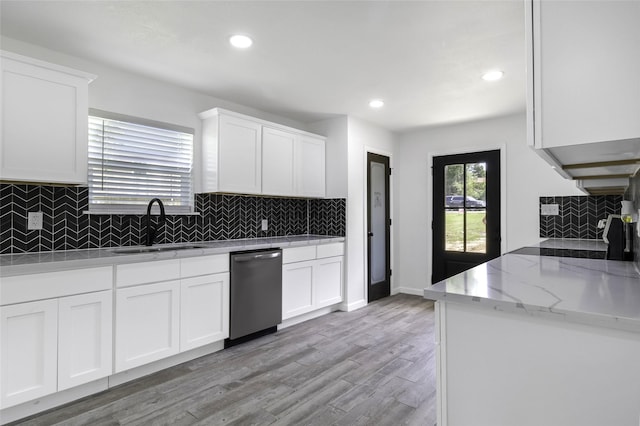 810 W Cattle Dr, Onalaska, TX 77360 - kitchen featuring stainless steel dishwasher, light stone counters, backsplash, recessed lighting, and white cabinets