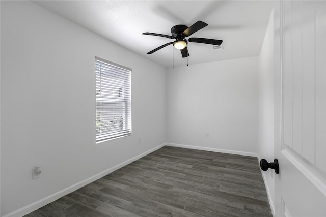 810 W Cattle Dr, Onalaska, TX 77360 - spare room with dark wood-type flooring and ceiling fan