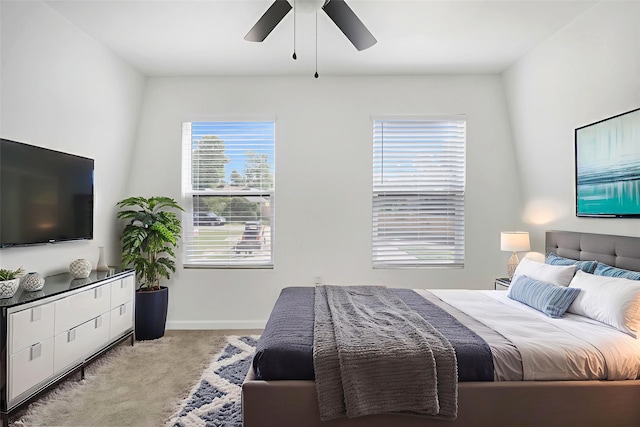 810 W Cattle Dr, Onalaska, TX 77360 - bedroom with carpet flooring and ceiling fan