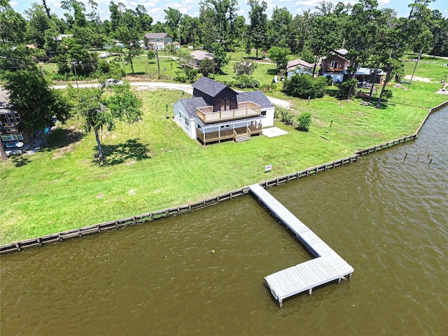 810 W Cattle Dr, Onalaska, TX 77360 - view of subject property featuring a large body of water and a tree filled landscape