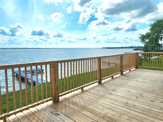810 W Cattle Dr, Onalaska, TX 77360 - wooden deck with a water view