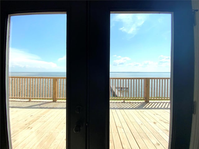 810 W Cattle Dr, Onalaska, TX 77360 - wooden terrace with a water view