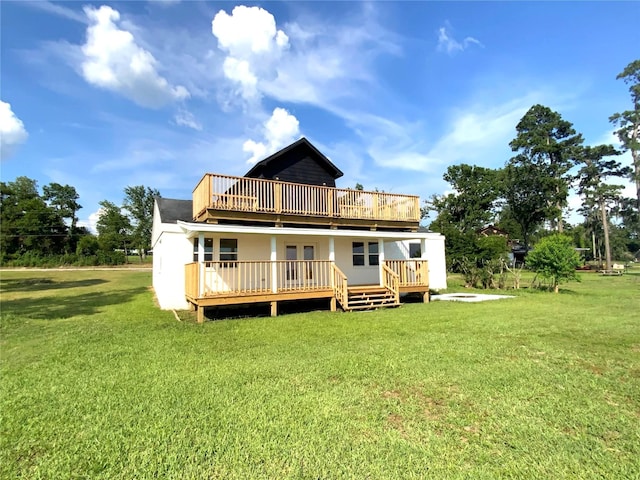 810 W Cattle Dr, Onalaska, TX 77360 - back of house with a wooden deck, a lawn, and french doors