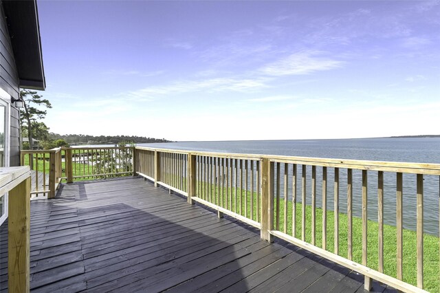 810 W Cattle Dr, Onalaska, TX 77360 - wooden deck with a water view
