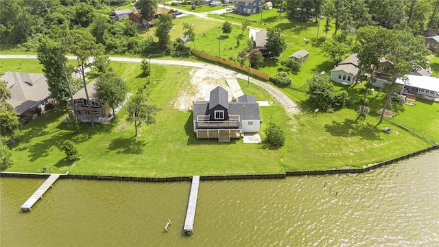 810 W Cattle Dr, Onalaska, TX 77360 - aerial perspective of suburban area featuring a large body of water
