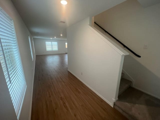 4127 Neches Bend Dr, Baytown, TX 77521 - hallway featuring wood finished floors, recessed lighting, and stairs