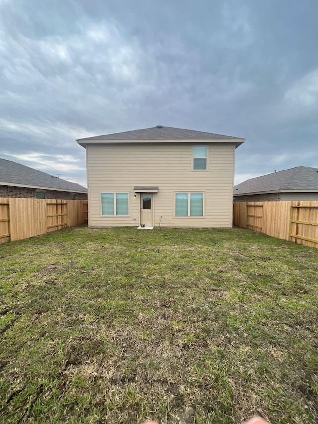 4127 Neches Bend Dr, Baytown, TX 77521 - back of house with a fenced backyard