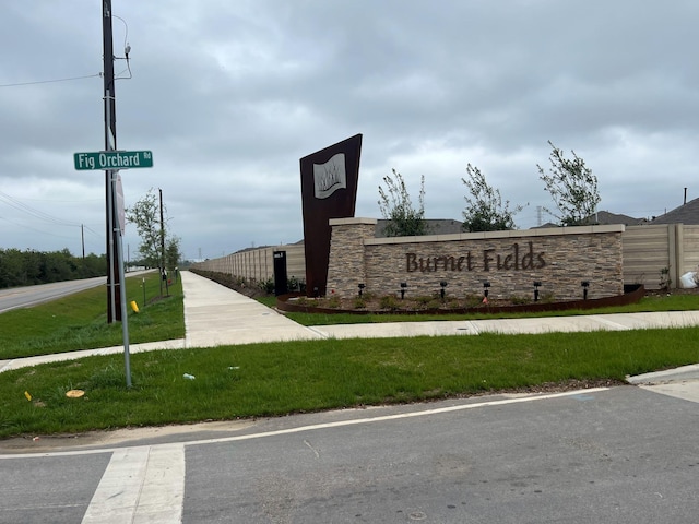 4127 Neches Bend Dr, Baytown, TX 77521 - community sign with a lawn