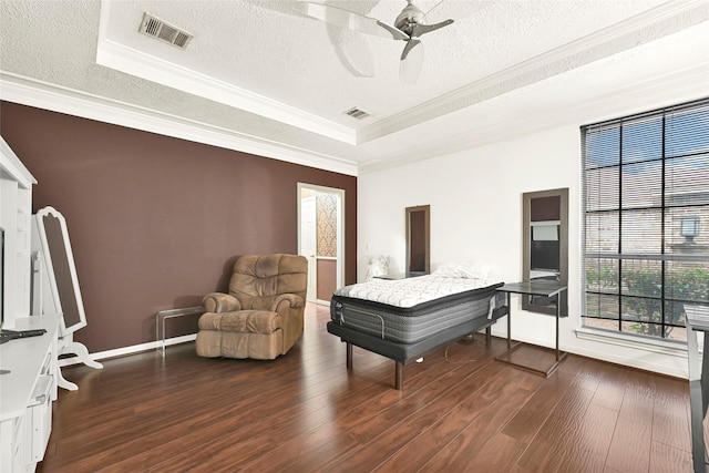 6710 Blue Hills Rd, Houston, TX 77069 - bedroom featuring a tray ceiling, a textured ceiling, wood finished floors, ornamental molding, and ceiling fan