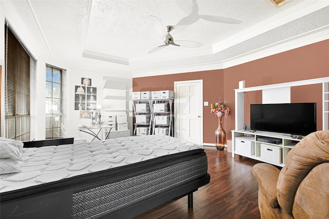 6710 Blue Hills Rd, Houston, TX 77069 - bedroom with a tray ceiling, a textured ceiling, crown molding, wood finished floors, and a ceiling fan